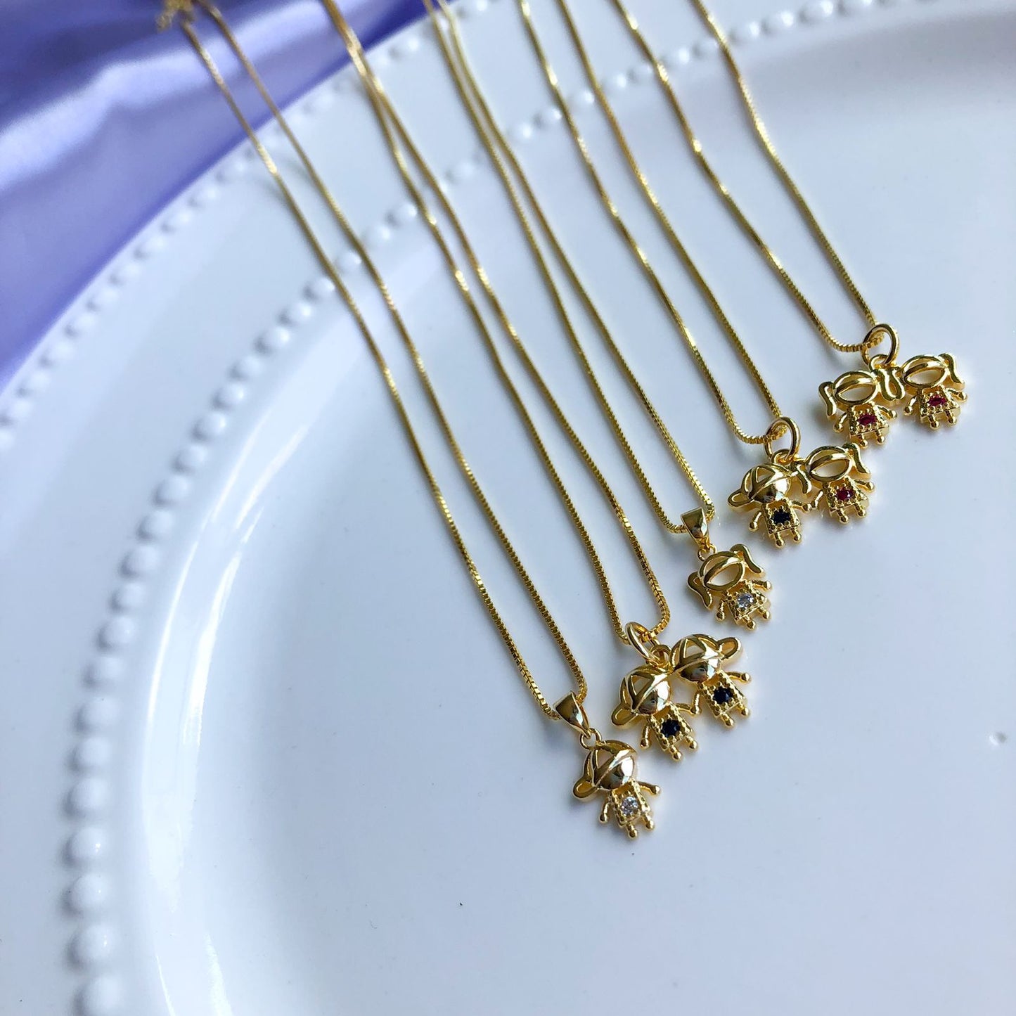 Colar de Casal de Filhos Banhado em Ouro 18k Nome:Menino